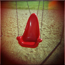 RED swing Red Swing on playground
